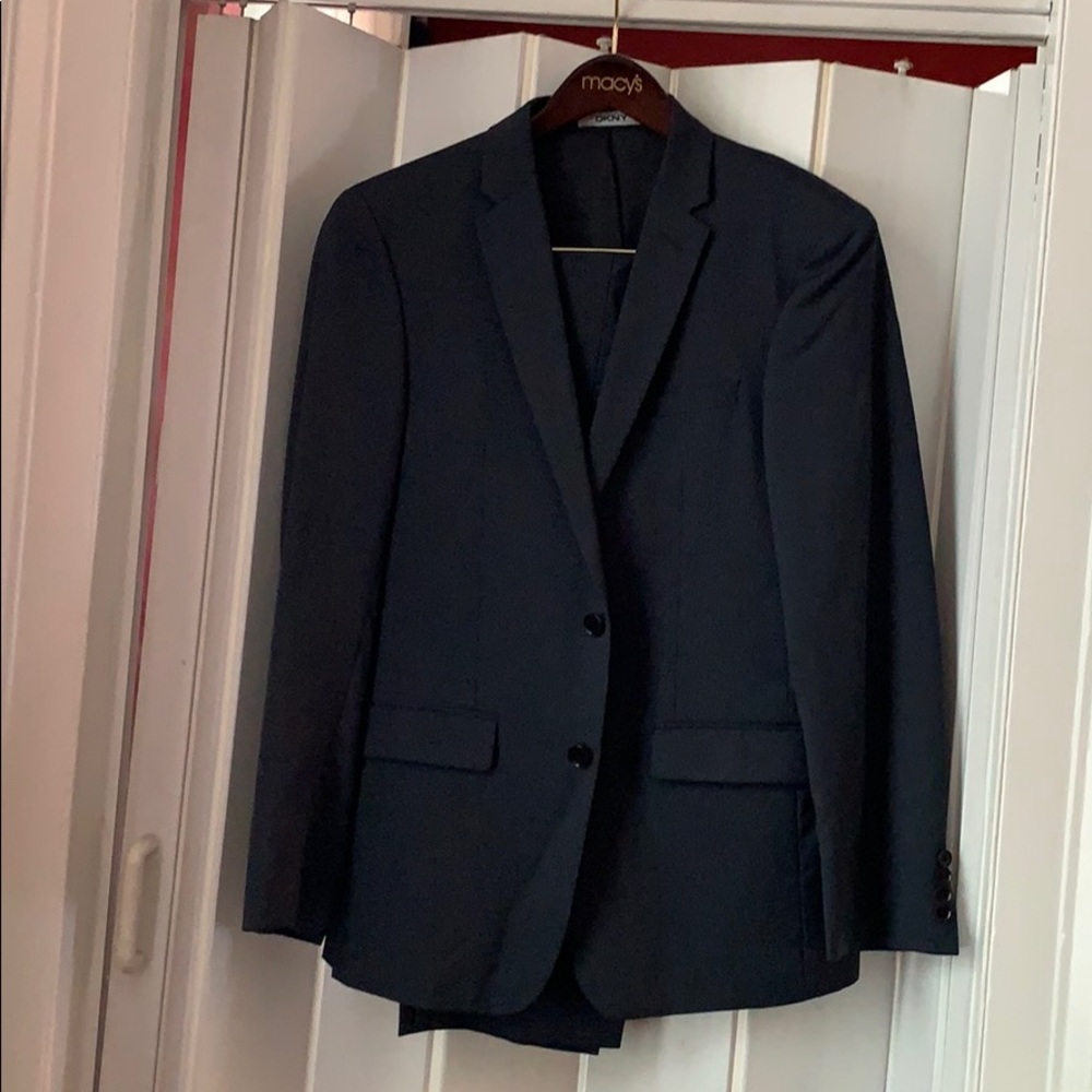 DKNY 2-piece suit. Striped blue color. Size 40R.